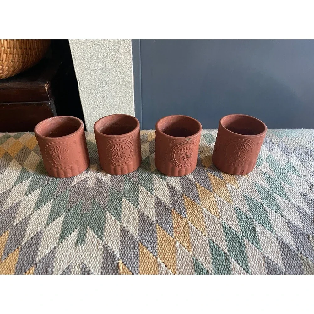 Painted small terra cotta style planters set of 4